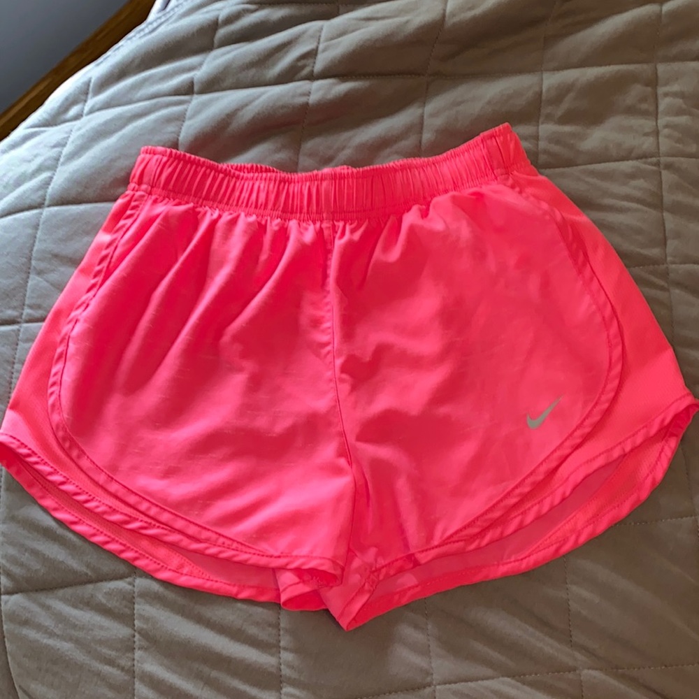 Bright pink Nike shorts
